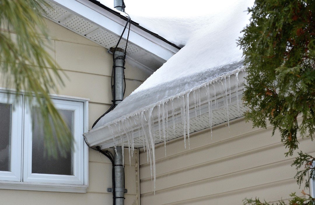 Winter-Ready Gutters: How Custom Solutions Prevent Ice Dams and Winter Damage